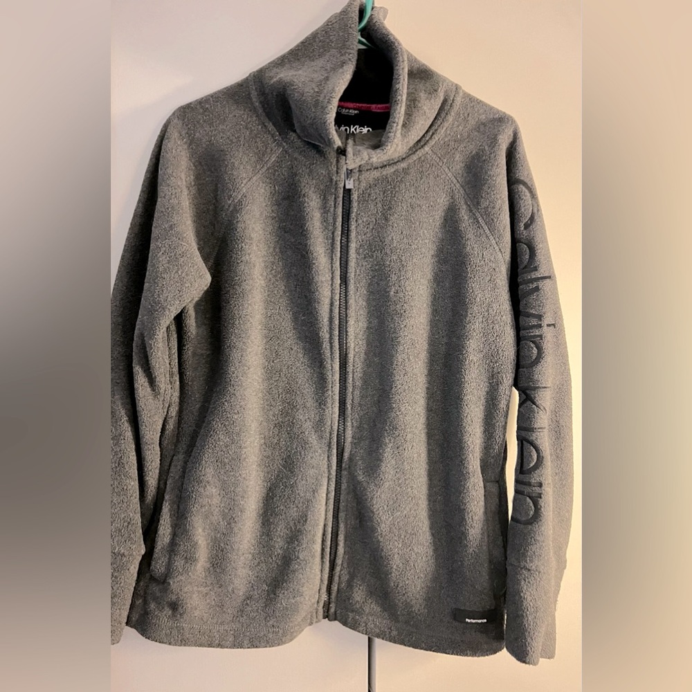 Women’s size M, fleece Calvin Klein Performance full zip jacket. Like new.